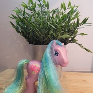 Pink and Blue Toy Pony with Floral Design